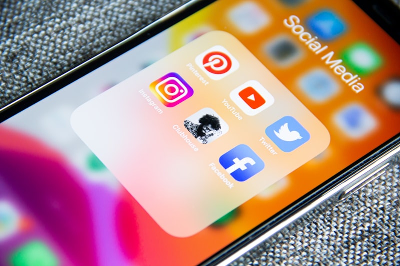 Smartphone showing a folder of social media apps